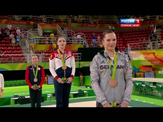 video спортивная гимнастика брусья великолепная спортсменка и прекрасная золотая девушка на пьедестале sex
